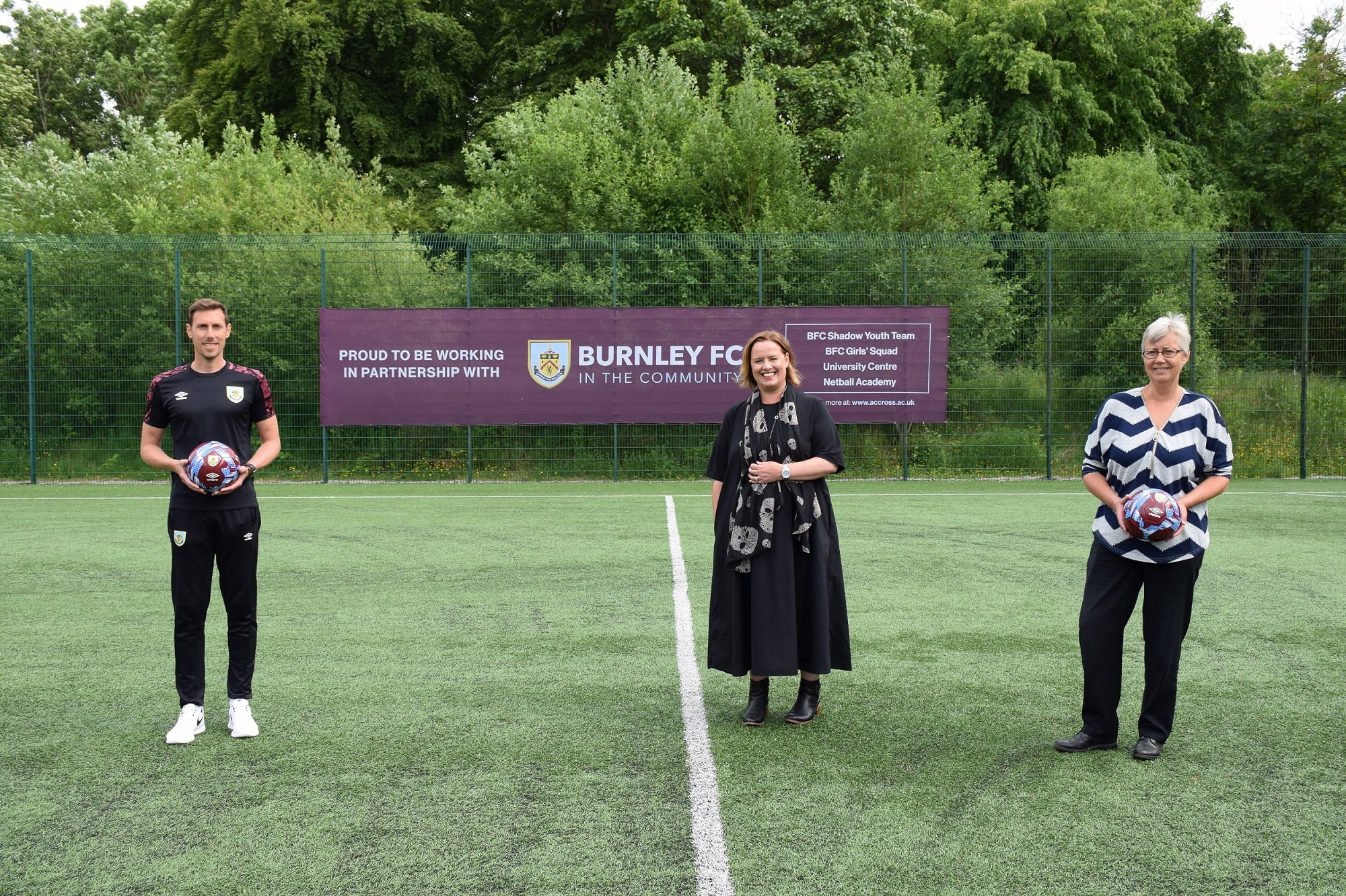 Chris Andrews and Dr Sara Ward, from Burnley FC in the Community, with Charlotte Scheffmann, Dean of Higher Education at Nelson and Colne College University Centre